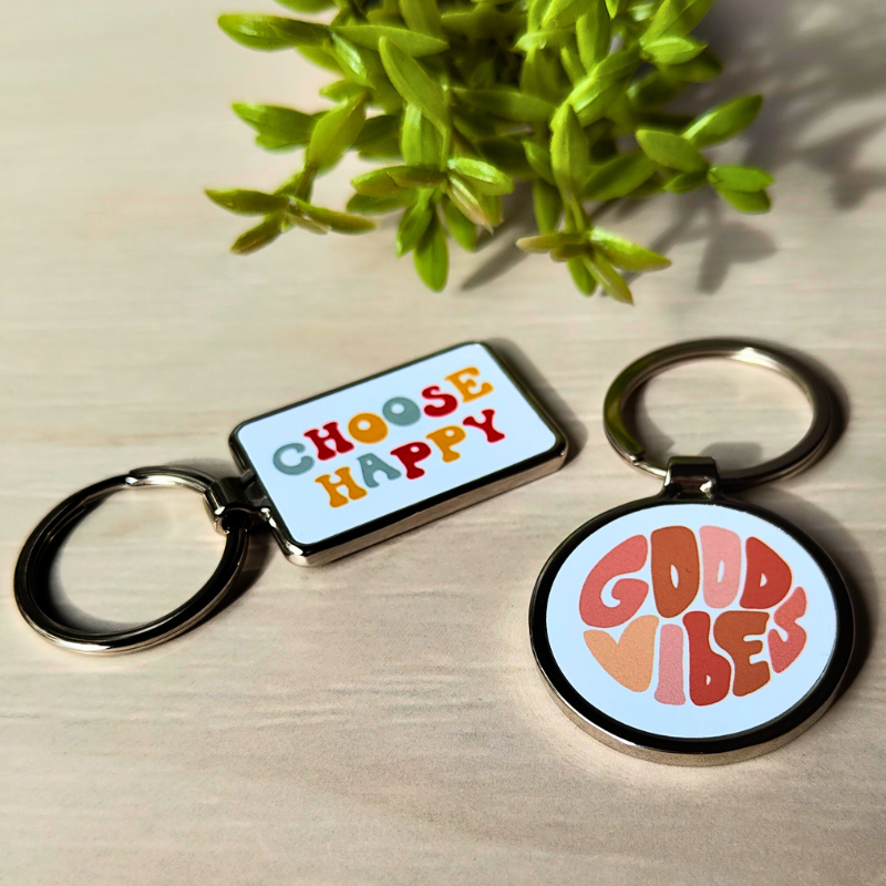 Groovy style metal keyrings with positive affirmations.