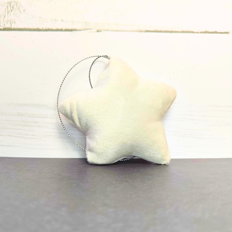 Hanging plush star, super soft in a lovely white colour. Easy decoration and comes ready to hang.