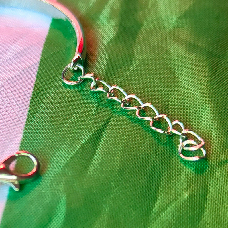 Adjustable length clasp metal bracelet with Palestine flag - raise charity for Gaza with these products.