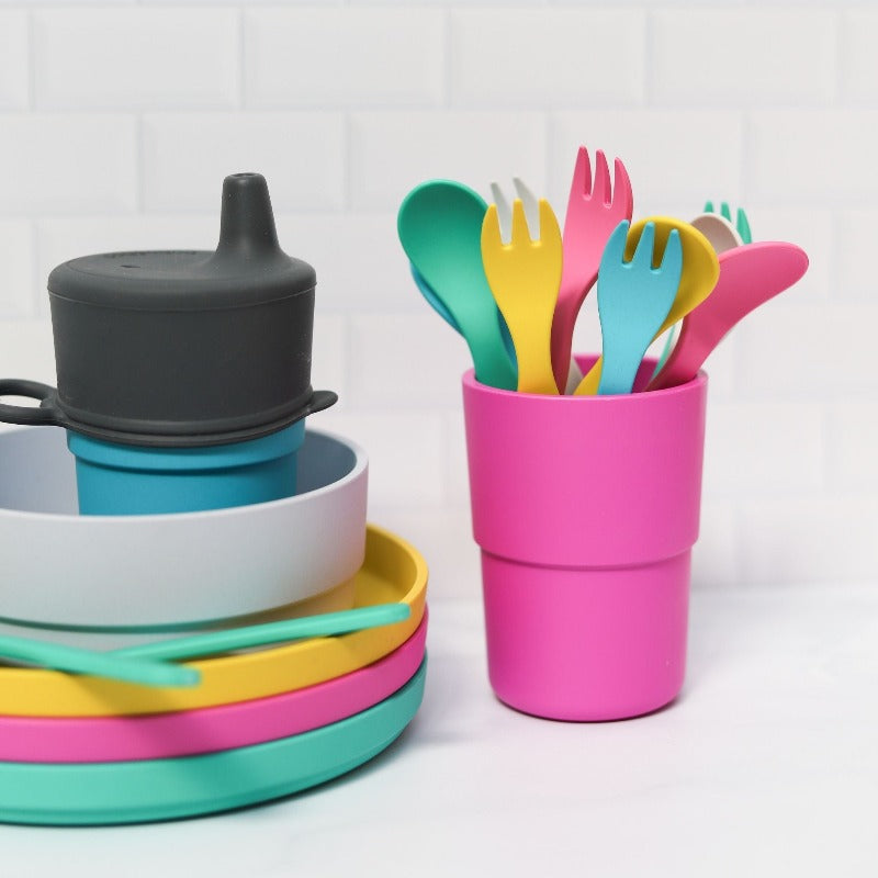 Free from melamine, and biodegradable and compostable, our plant-based spoon and fork cutlery set makes mealtimes (and sneaky snacks) way more fun! Cutlery displayed in pink cup alongside other bobo and boo products.
