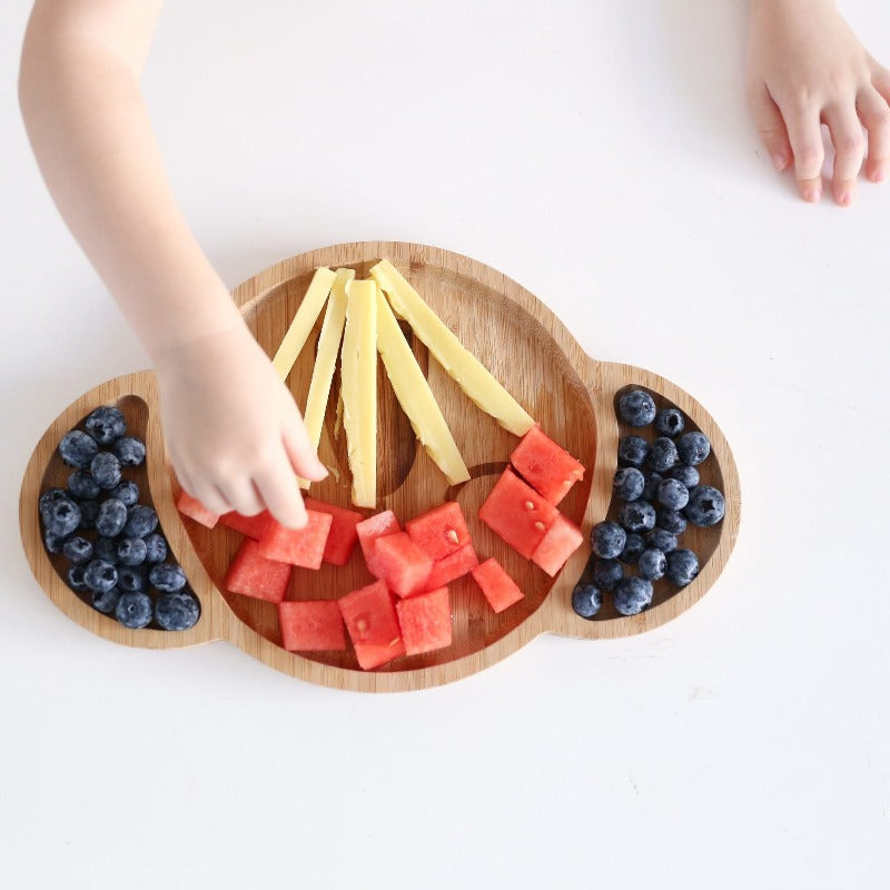 Karri Koala Toddler Feeding Plate: where sustainability meets creativity.  Lifestyle image with fruit on plate