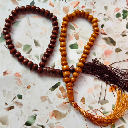 Islamic wooden prayer beads with 33 beads and tassel.