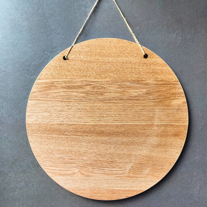 Alhamdulillah Arabic wooden sign reverse side with light wood grain.