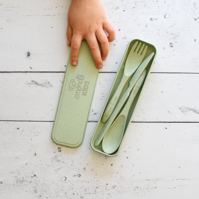 Eco-Friendly Cutlery Set for Babies & Toddlers. Green set, open with kids hand.