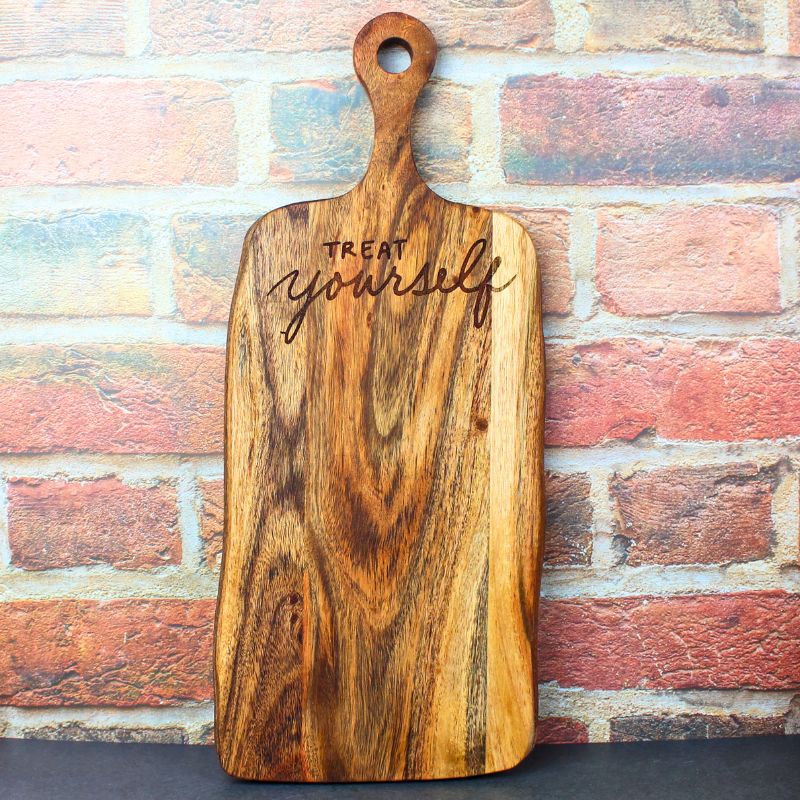 Treat Yourself engraved acacia wooden food serving board for dessert platters or charcuterie board.