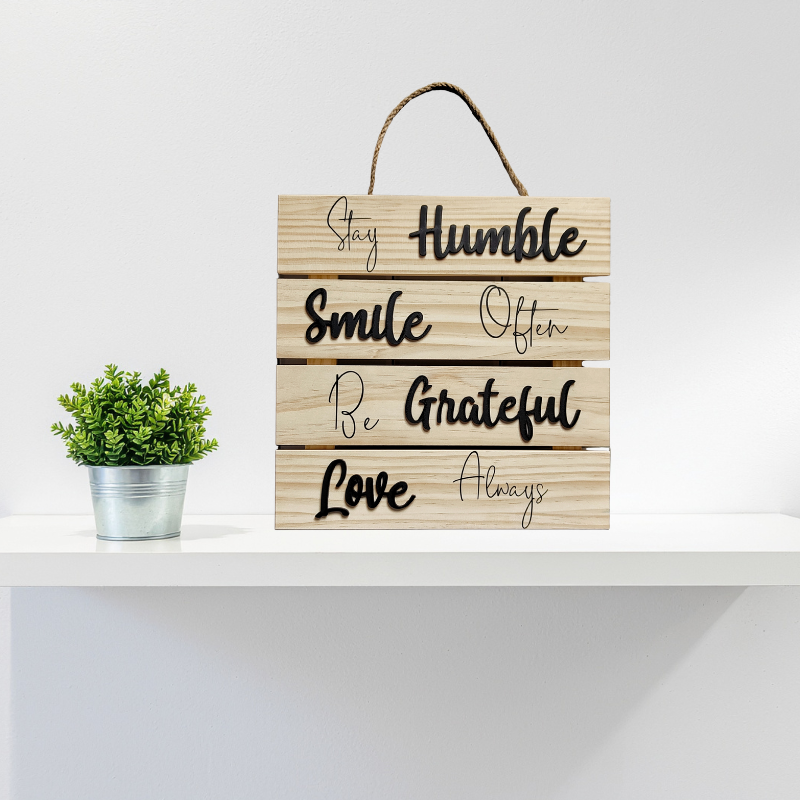 Handmade wooden affirmation wall sign displayed on a wall in a modern Islamic home interior, minimalist pine wood decor
