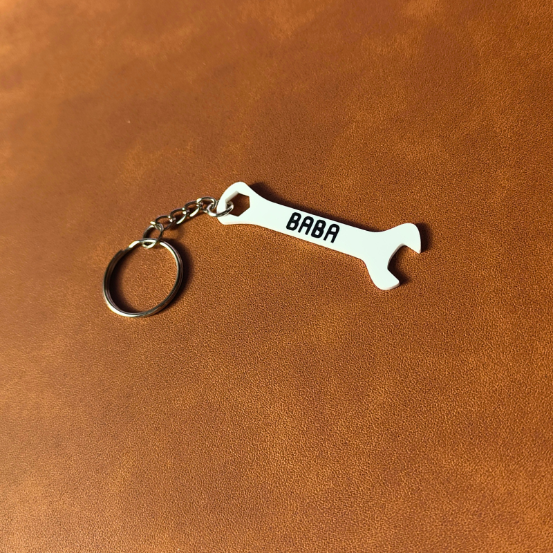 White Spanner Keyring for Baba