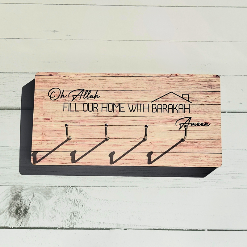 Fill our home with Barakah, wooden key hooks sign.