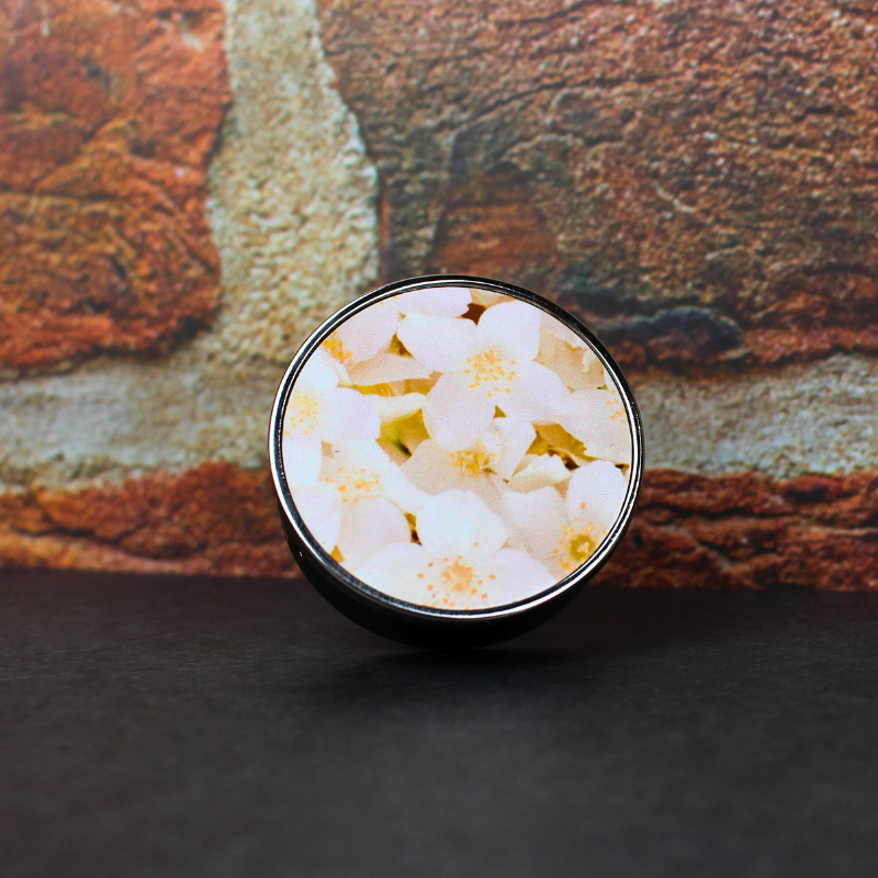 Jasmine printed air freshener with fresh jasmine scent for the car.