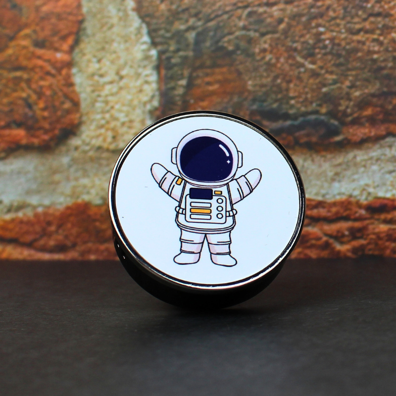 Car vent air freshener with fresh cotton scent and adorable astronaut print.