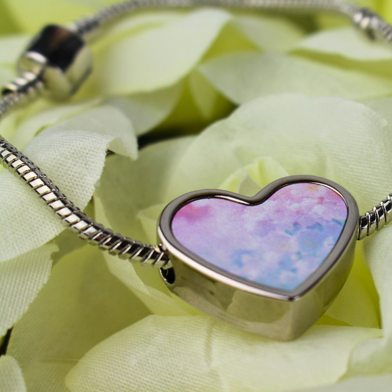 Pink and blue pastel heart charm silver bracelet.