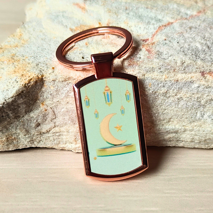 Crescent moon, star and lanterns rose gold look Islamic keyring.