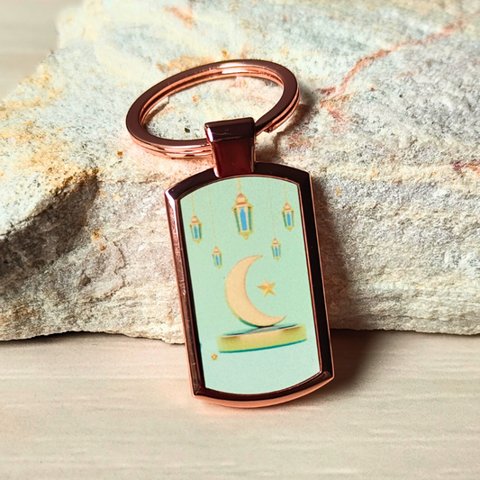 Crescent moon, star and lanterns rose gold look Islamic keyring.