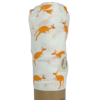 Wrap your baby in pure comfort with our GOTS certified organic cotton muslin swaddle. Ethically made and toxin-free, our breathable swaddle is perfect for newborns. Kangaroo design on white background.