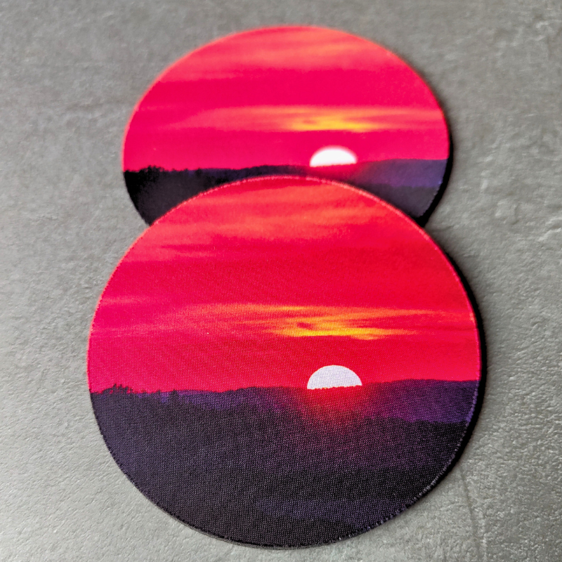 Sunset printed non-slip neoprene drink coasters.