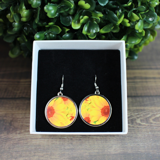 Round sunflower stainless steel drop earrings front view