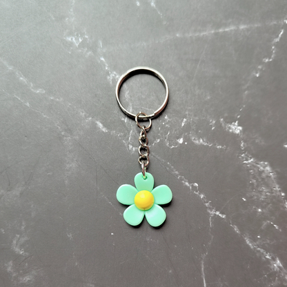 PVC green and yellow flower keyring.