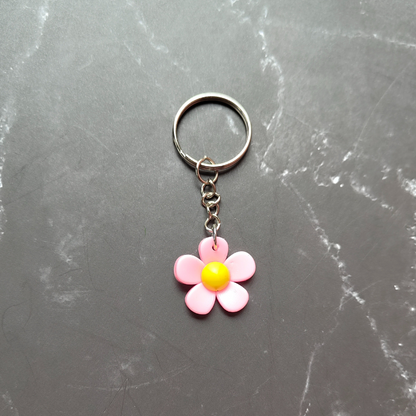 Pink and yellow flower keyring made from sturdy and durable PVC.