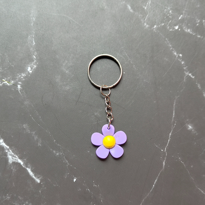 Purple and yellow flower keyring made from sturdy PVC.