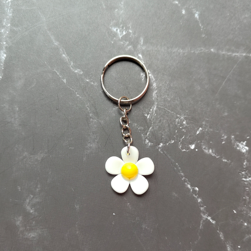 White and yellow PVC keyring. Cute small gift idea for under $5.