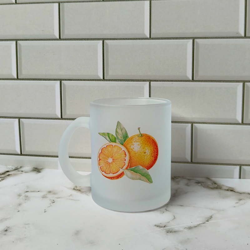 Orange printed frosted glass cup.
