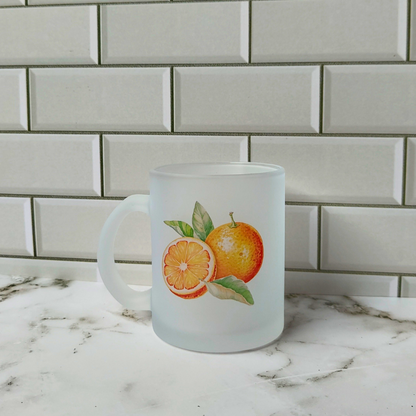 Orange printed frosted glass cup.