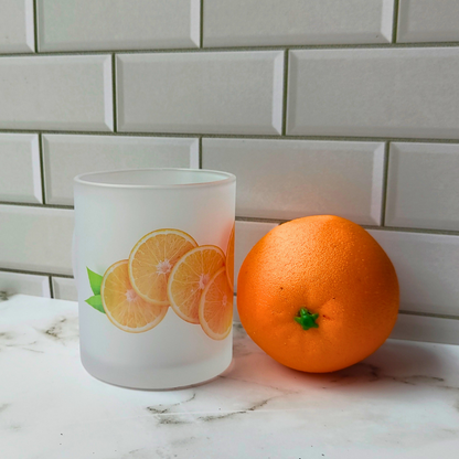 Sliced orange printed frosted glass cup.