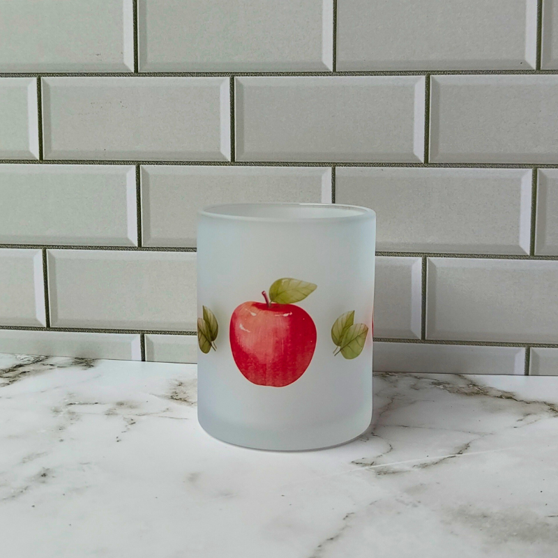 Glass frosted cup with cute apple print. Teacher gift idea.