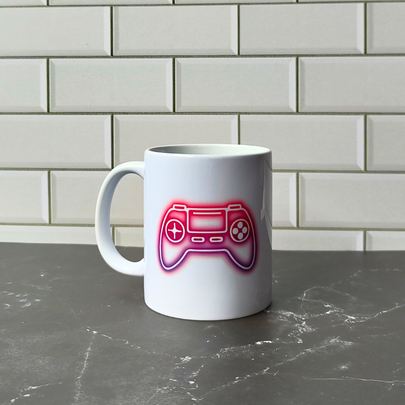 Neon gaming controller printed mug. The perfect gift for any gamer.