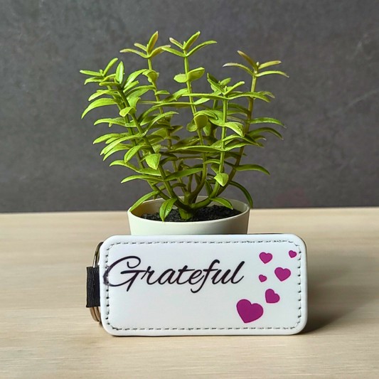 Affirmation print ' Grateful' vegan leather keyring.
