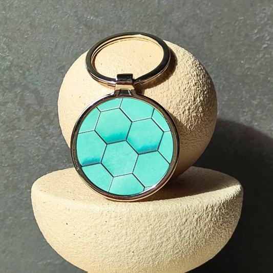 Green geometric shapes keyring - round metal keychain. Keyrings under $10.