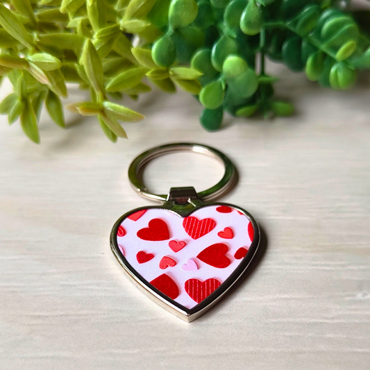 Heart Candy printed metal heart-shaped keyring. 