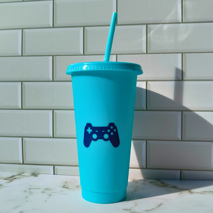 Blue gaming cold cup with playstation controller design.