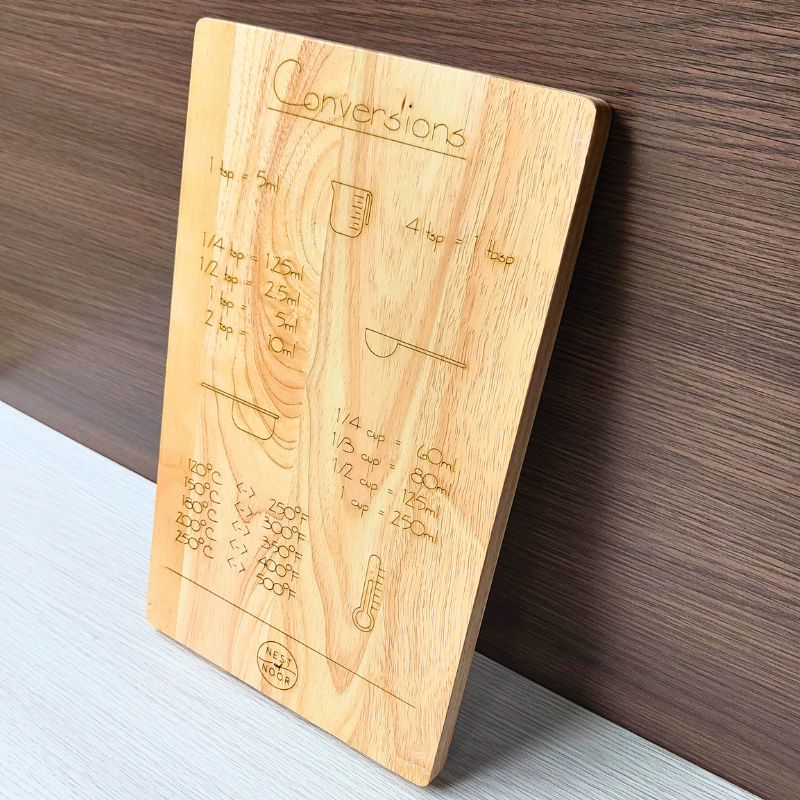 Wooden kitchen board with Australian cooking conversions
