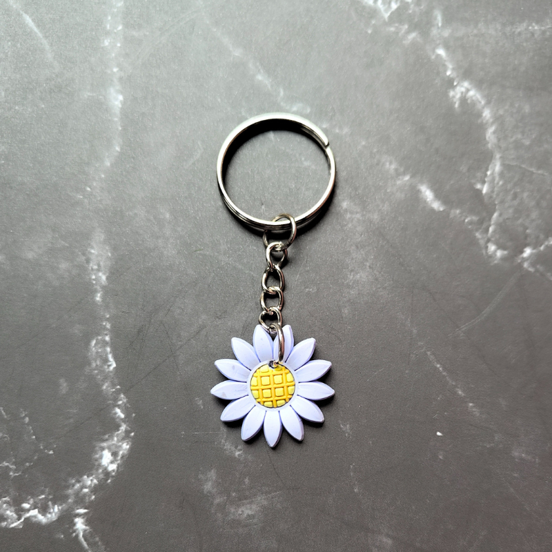 Light blue and yellow sunflower keyring.