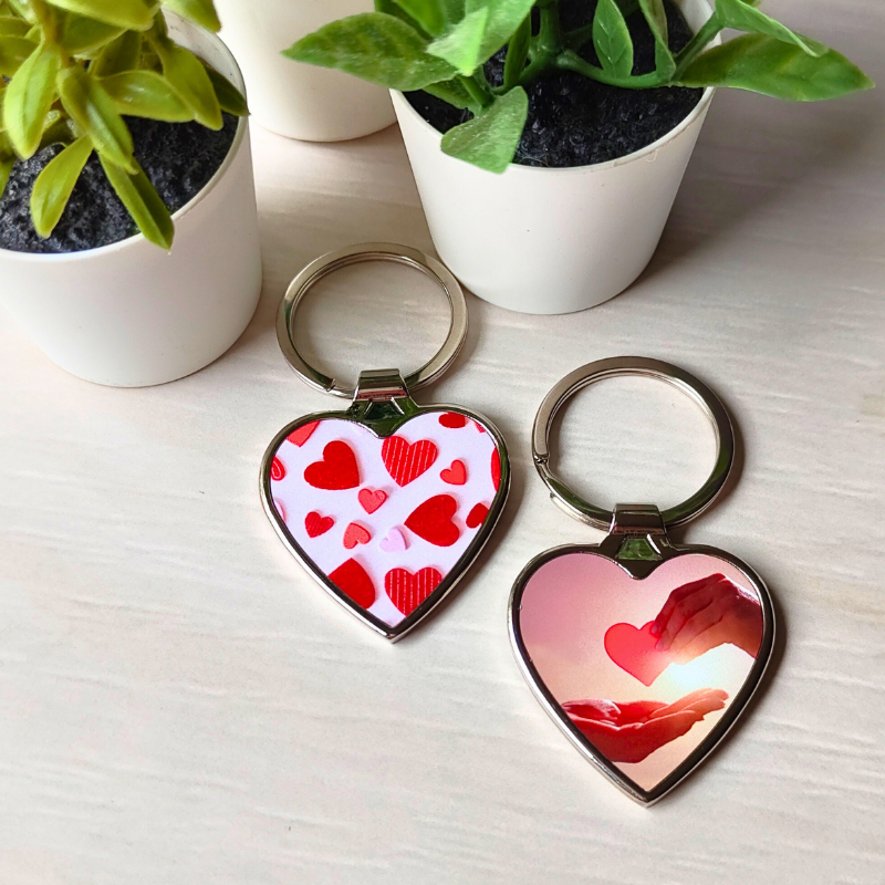 Heart-shaped metal keyrings with heart designs. Keyrings under $10.