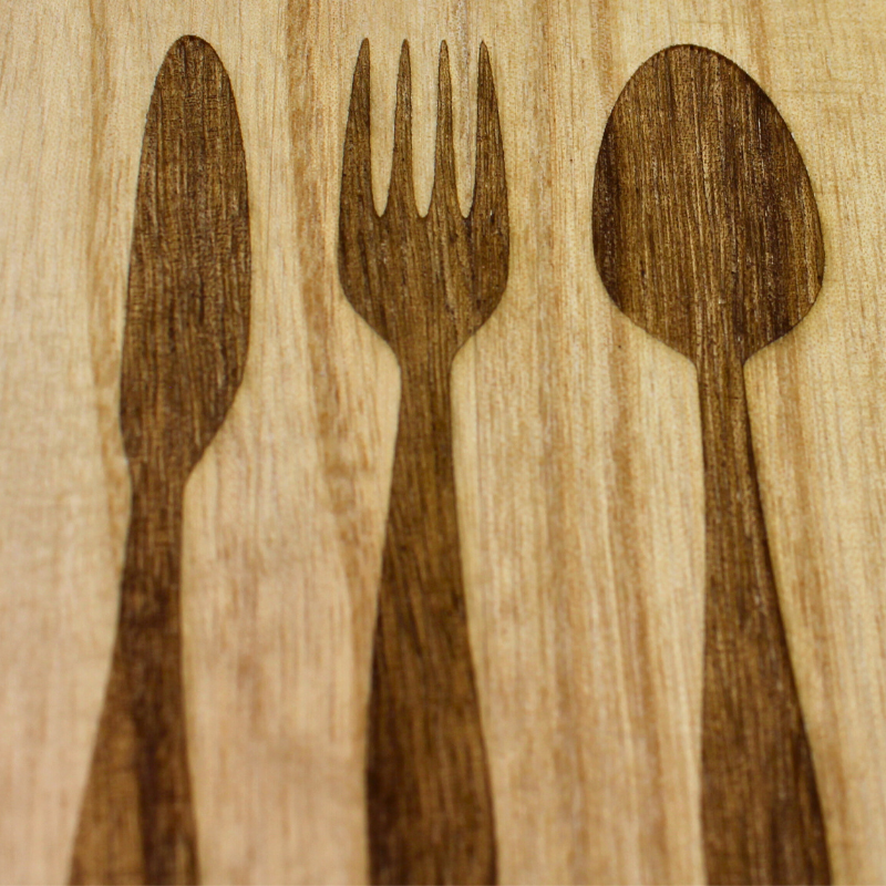 Engraved Islamic wooden paddle board designed for the kitchen or dining room.