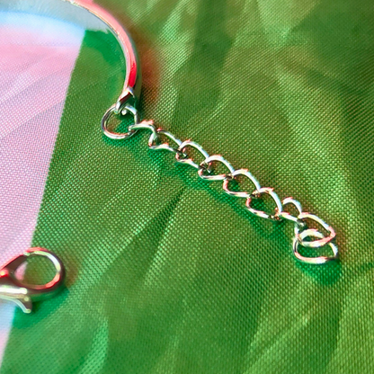 Adjustable length clasp metal bracelet with Palestine flag - raise charity for Gaza with these products.