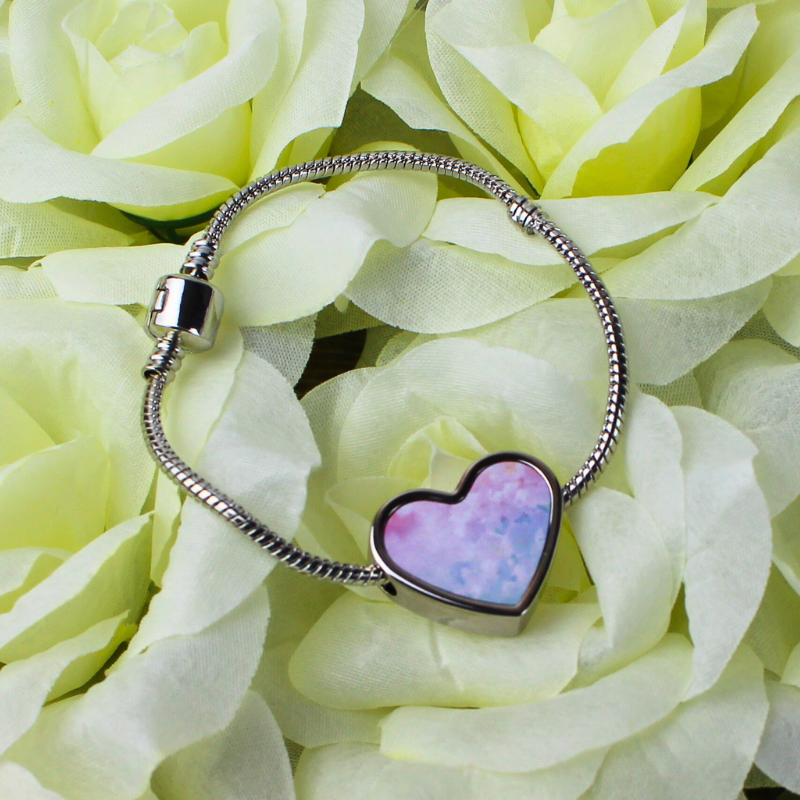 Pastel pink and blue heart charm bracelet.