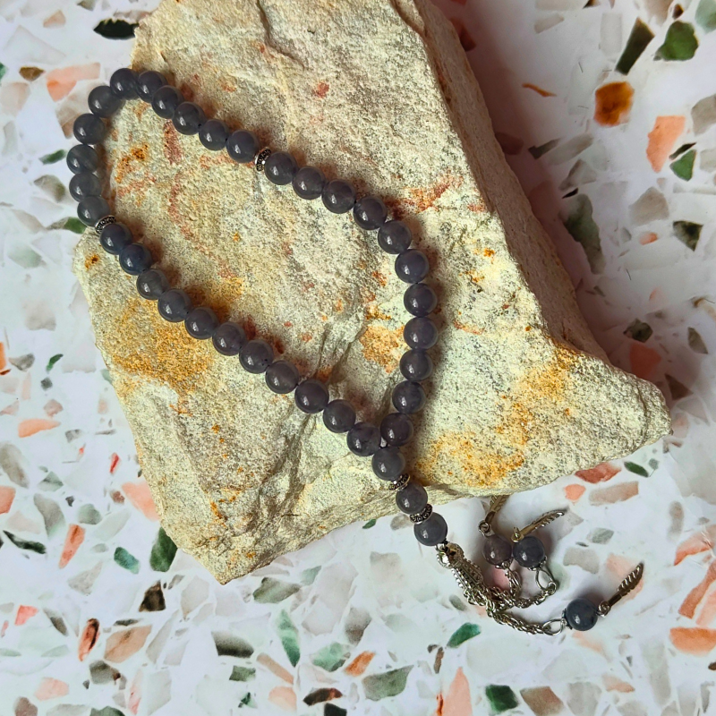 33 Count Islamic prayer beads, grey beads, with metal tassel.