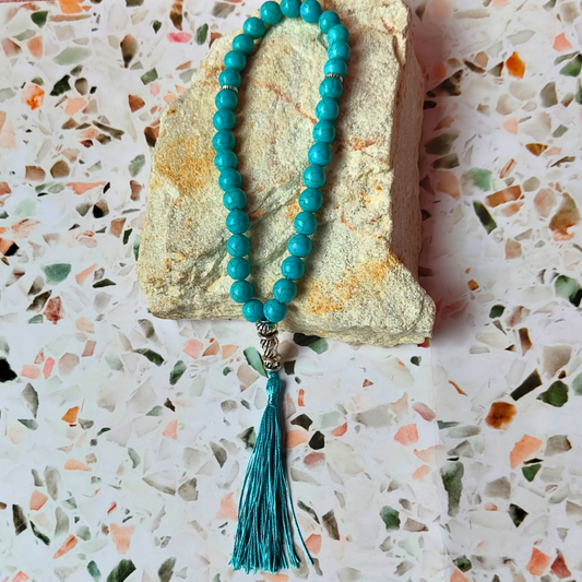 Teal, stone-look Islamic Tasbih prayer beads with 33 count.