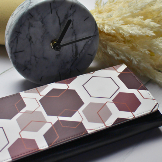 Vegan leather purse with geo shapes brown print with clock and flowers background
