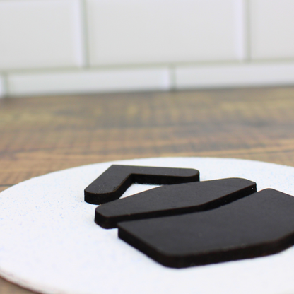 Modern qibla directional arrow. Wooden with raised wood arrows.