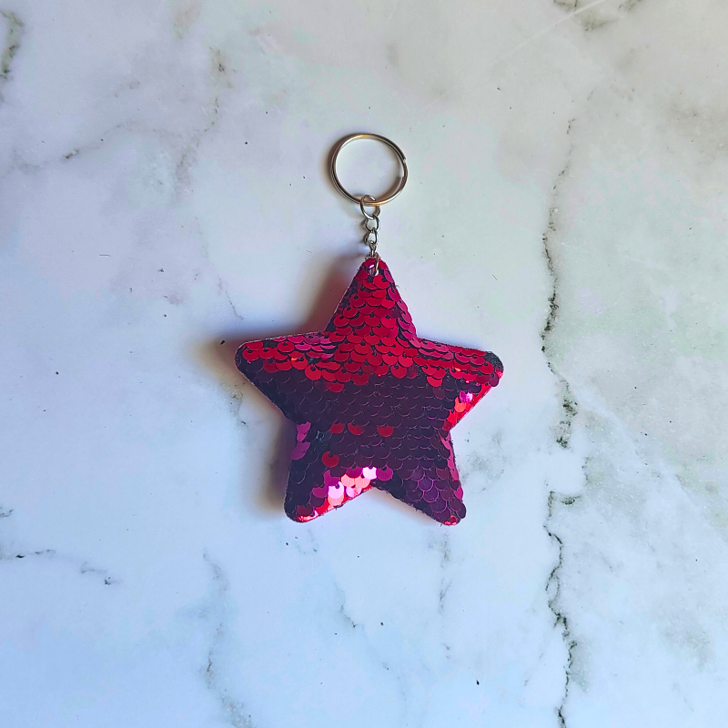 Red sequin sensory flip keyring.