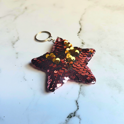 Red and gold sequin flip sensory star keyring.