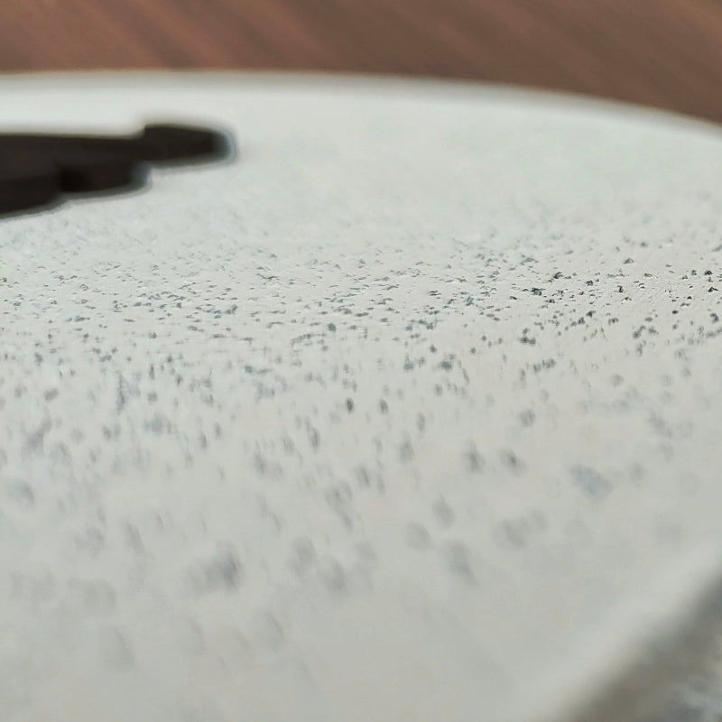 Close-up of stone finished wooden sign