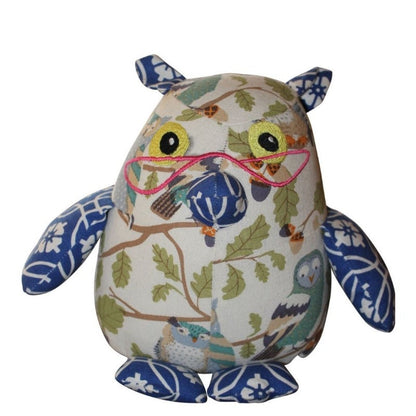 Discover our collection of handmade Organic and Eco-Friendly Stuffed Owl Toys. Owl on white background.