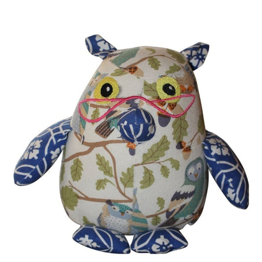 Discover our collection of handmade Organic and Eco-Friendly Stuffed Owl Toys. Owl on white background.