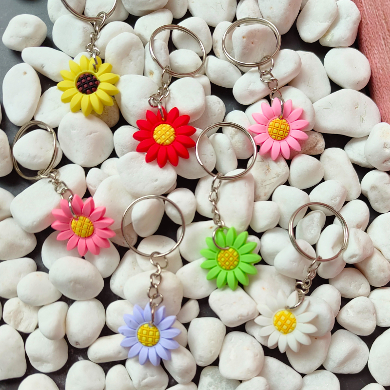 PVC sunflower keyrings in a large range of colours. Small gift idea for cheap.