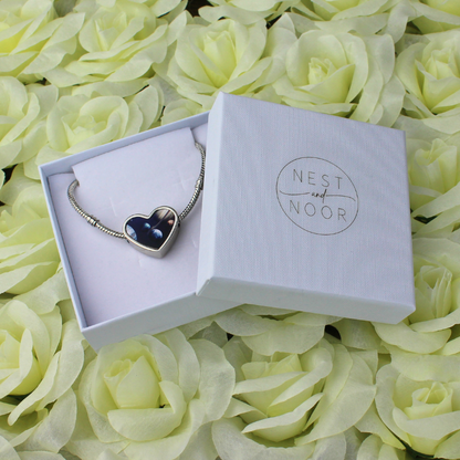 Planets in the universe heart charm printed silver charm bracelet in white gift box.